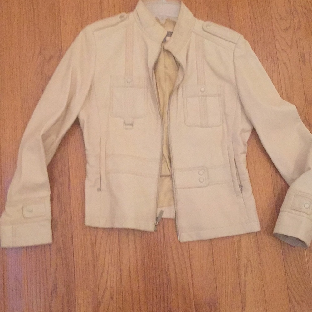 Medium cream colored Kenneth Cole leather jacket.